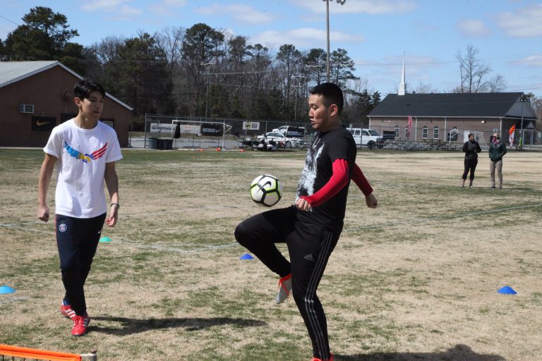 Kazakhstan & Kyrgyzstan students play soccer in Richmond.